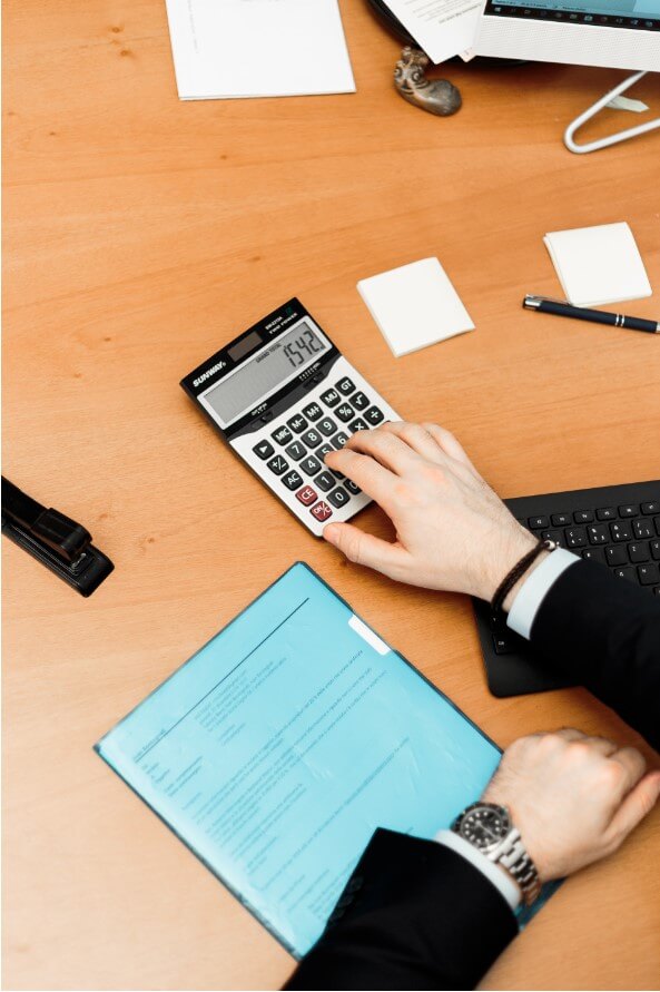 Accountant using a calculator